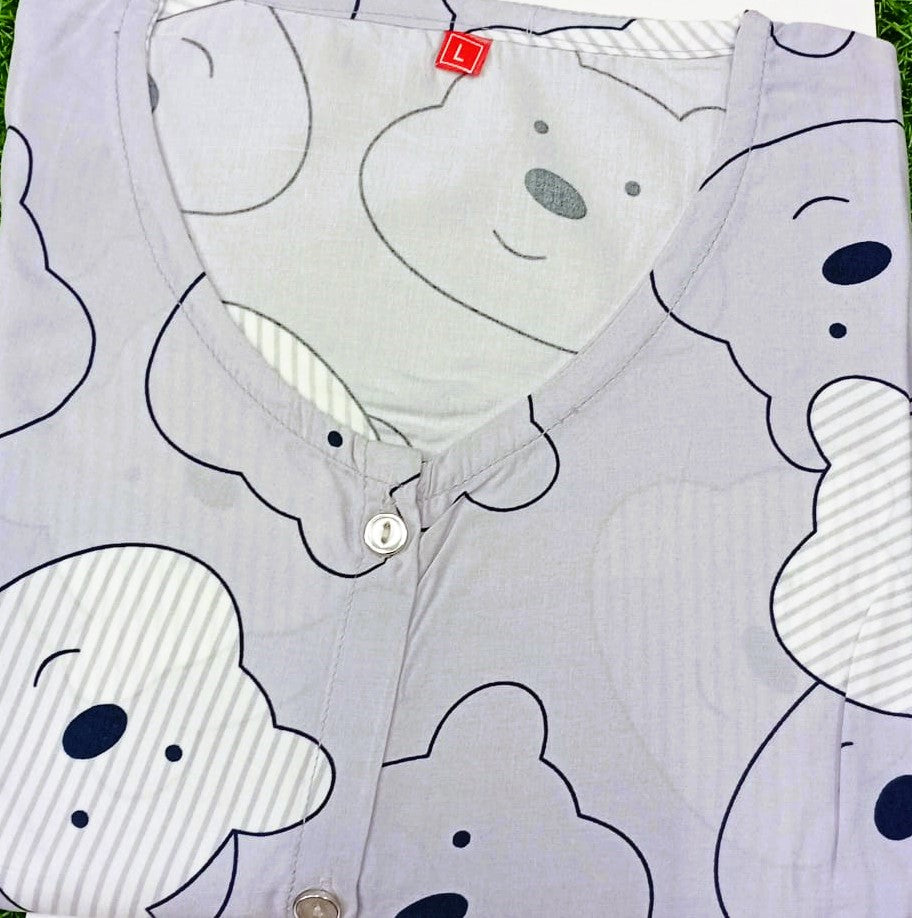 Light gray shirt with cartoon ghost pattern on a white background