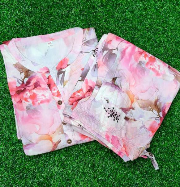 Floral-patterned bags on a grassy background
