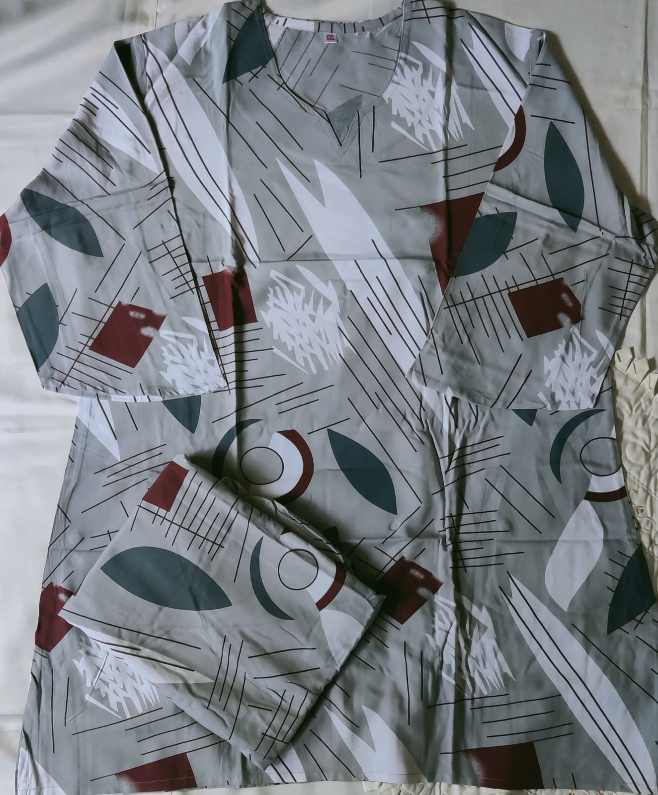 Patterned shirt with geometric design on a plain background