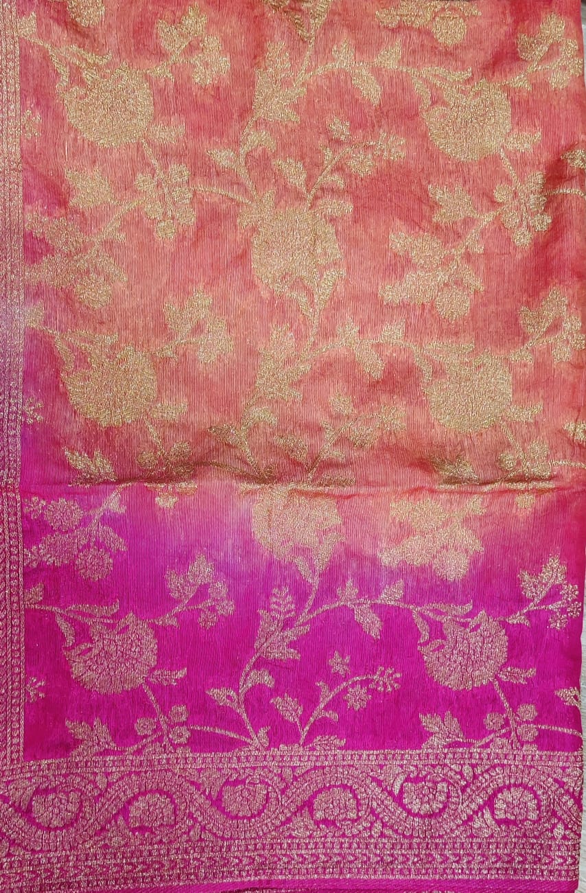 Pink fabric with gold floral patterns