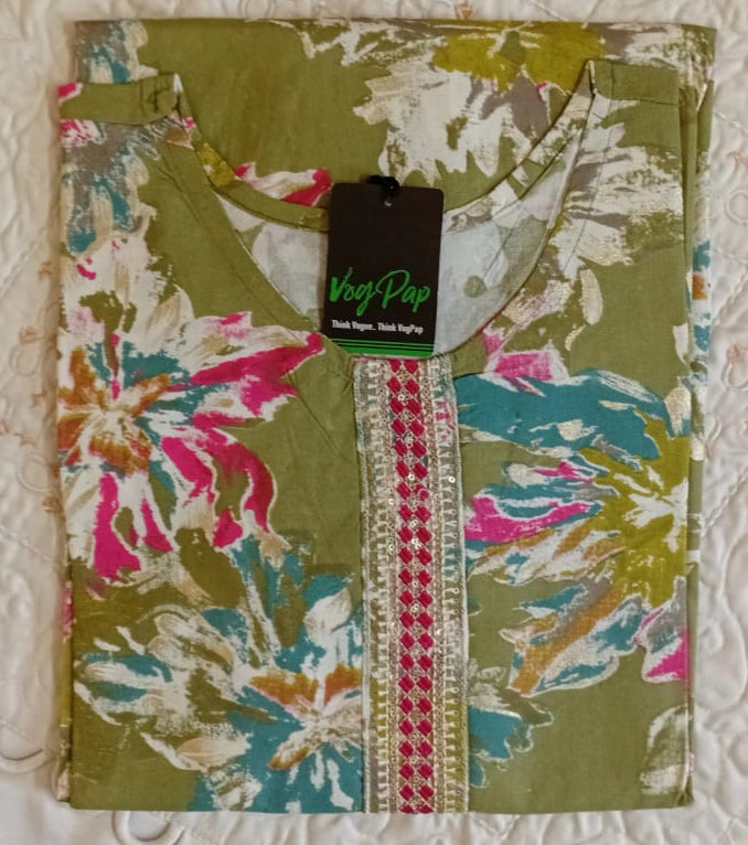 Floral-patterned fabric on a textured white surface with a brand tag.