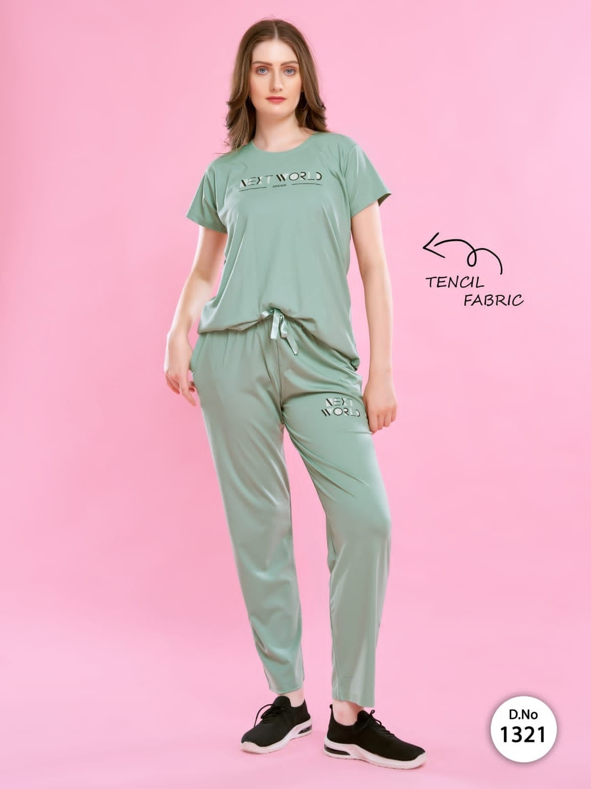 A woman wearing a Tencel Buttery Super Soft Tshirt and Pant Set (TRACKSUIT) , showcasing its luxurious fabric and elegant design.
