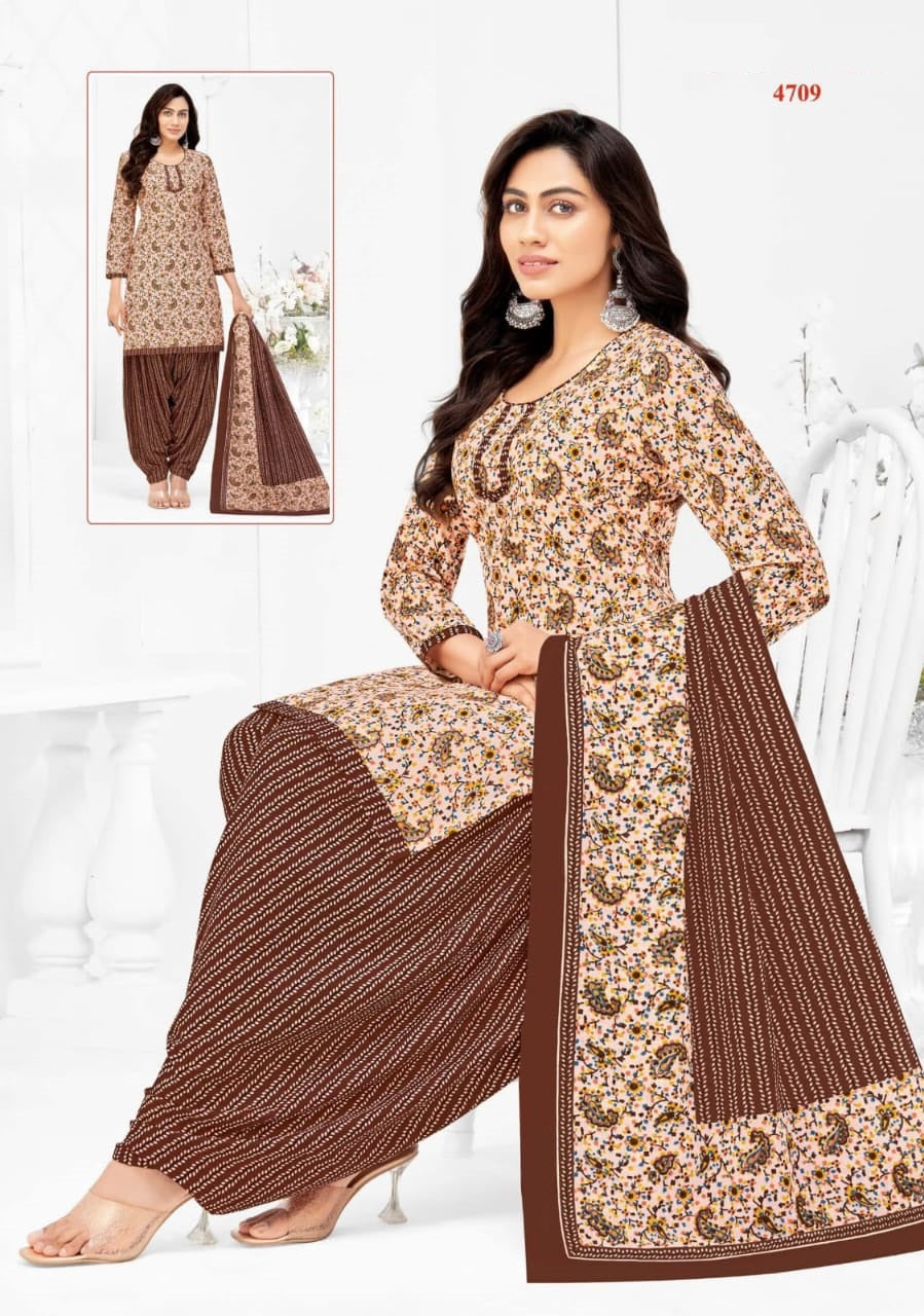 Woman wearing a brown and beige traditional outfit with a matching dupatta on a white background.