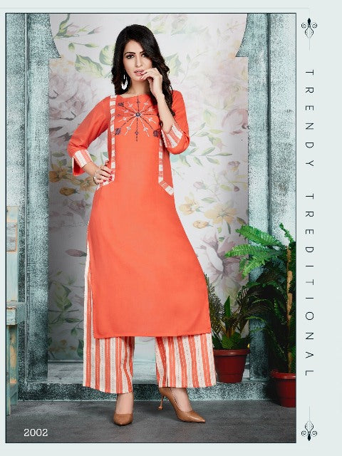 orange kurti with white lining palazzo