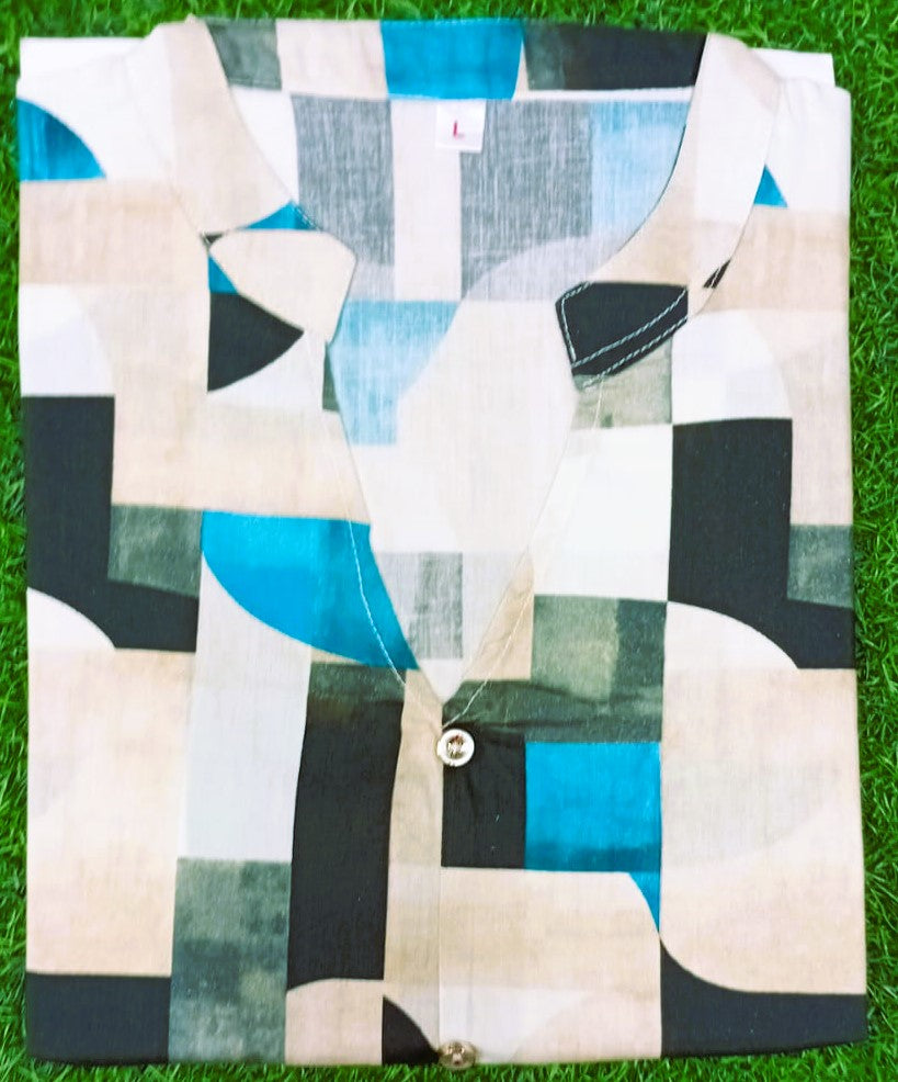 Colorful patterned shirt on a grass background