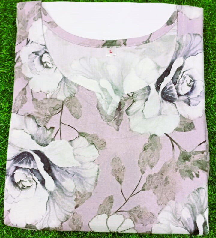 Floral-patterned fabric on a grass background