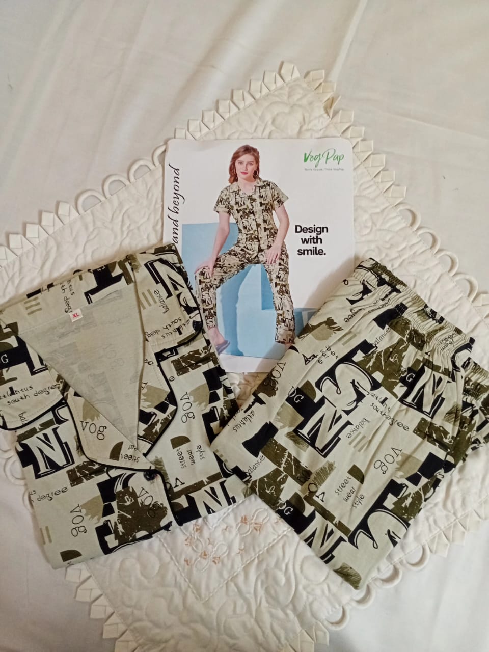 Fabric swatches with text patterns on a decorative white surface