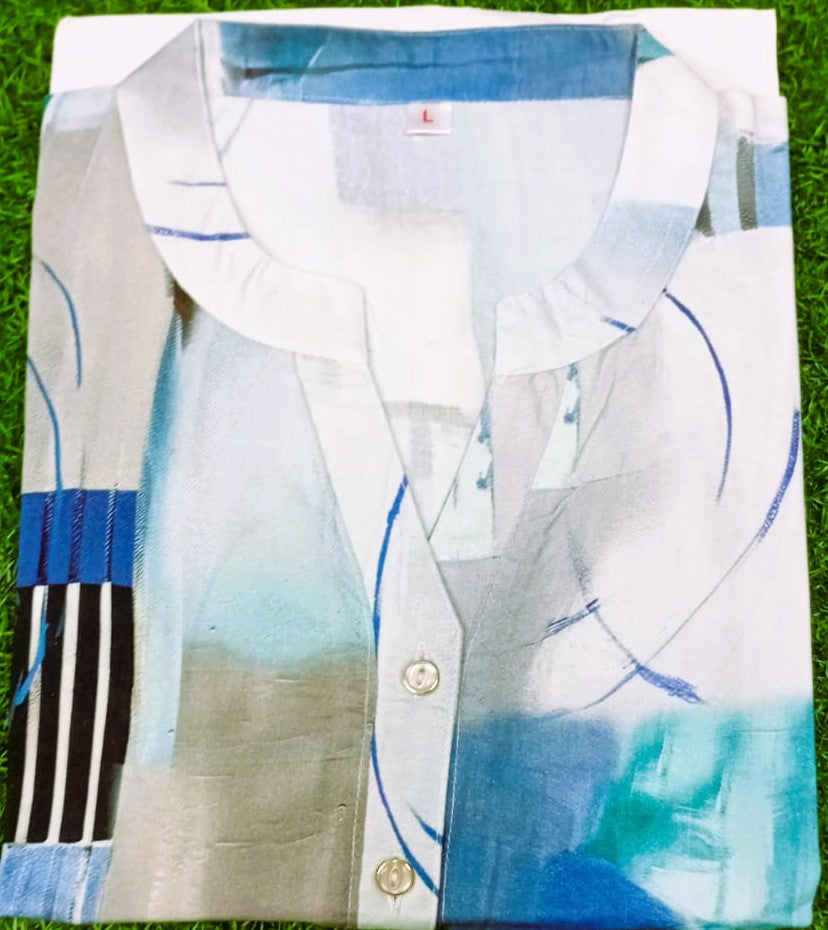 Colorful shirt with abstract patterns on a grass background