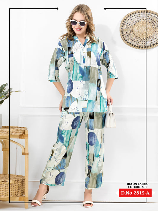 Woman wearing a colorful outfit with abstract patterns in a minimalistic setting.