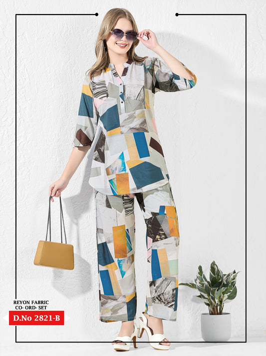 Woman wearing a colorful patterned outfit with sunglasses and a handbag on a white background