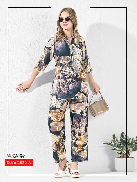 Woman wearing a colorful outfit with a matching handbag on a white background