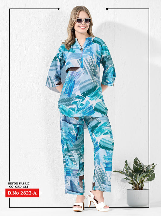 Woman wearing a blue and white patterned outfit with sunglasses on a white background