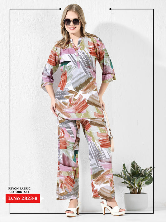 Woman wearing a colorful outfit with a plant in the background