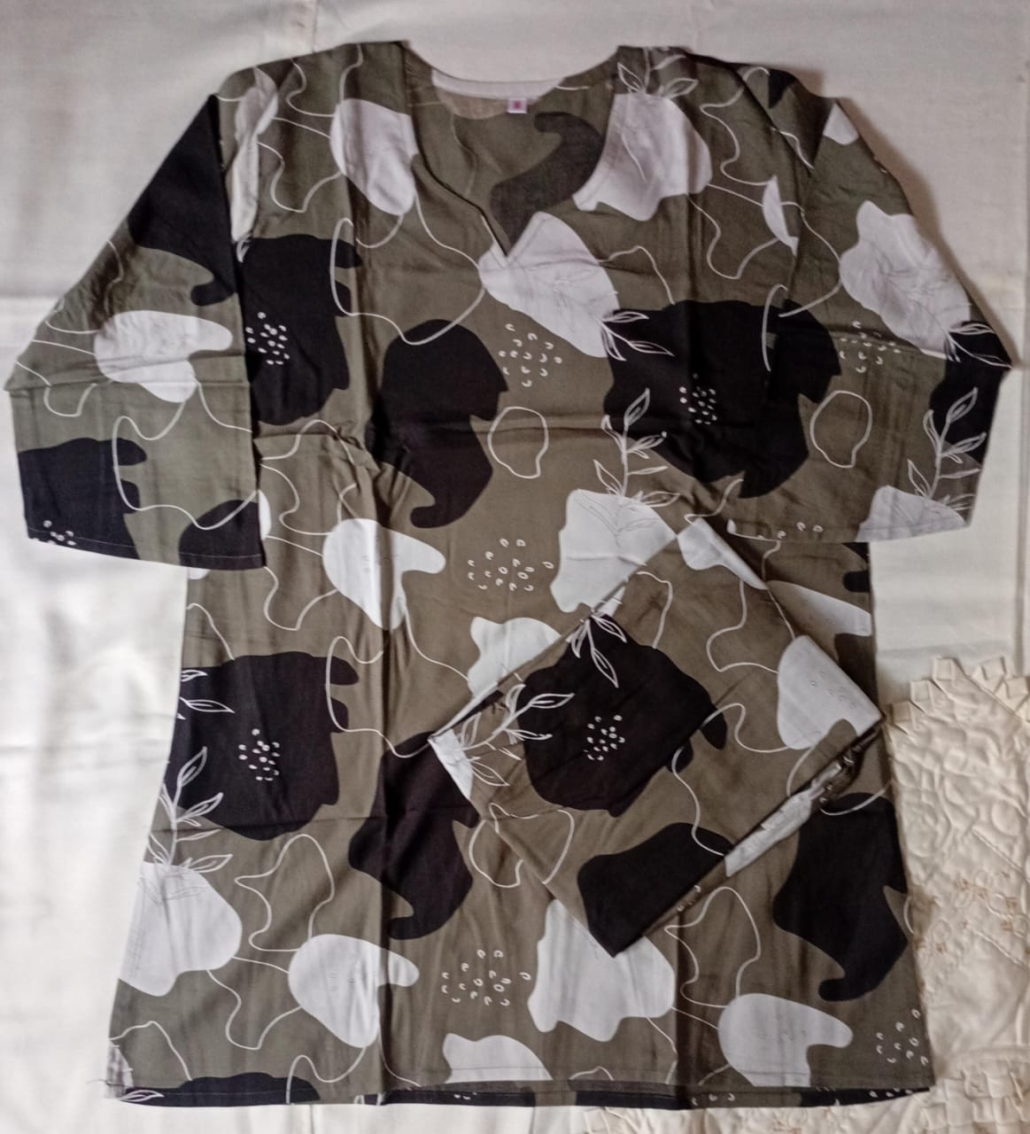 Floral patterned garment on a white background