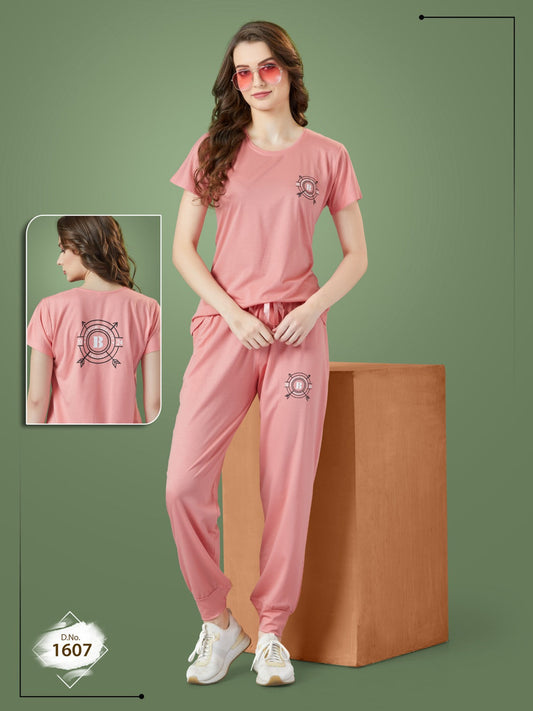 A woman wearing a Tencel Buttery Super Soft Tshirt and Pant Set (TRACKSUIT) , showcasing its luxurious fabric and elegant design.