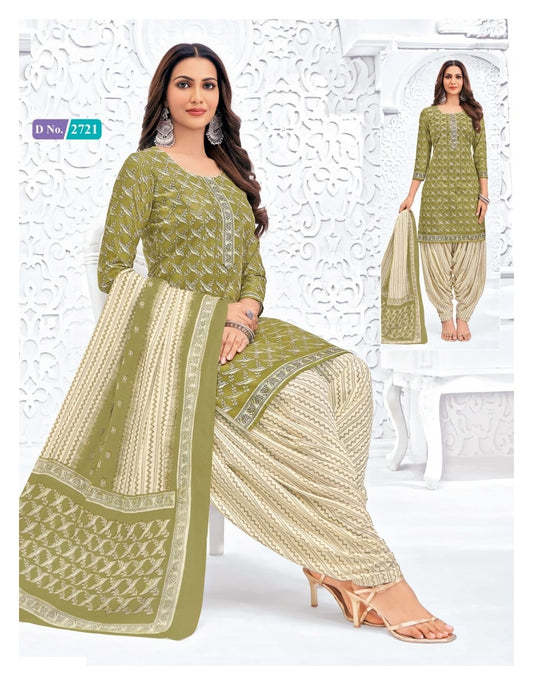 Woman wearing a green and beige traditional outfit with a white background