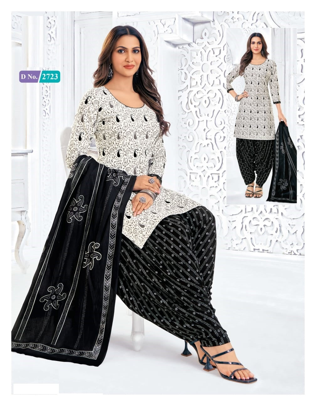Woman wearing a black and white traditional outfit with a scarf, sitting on a white chair.