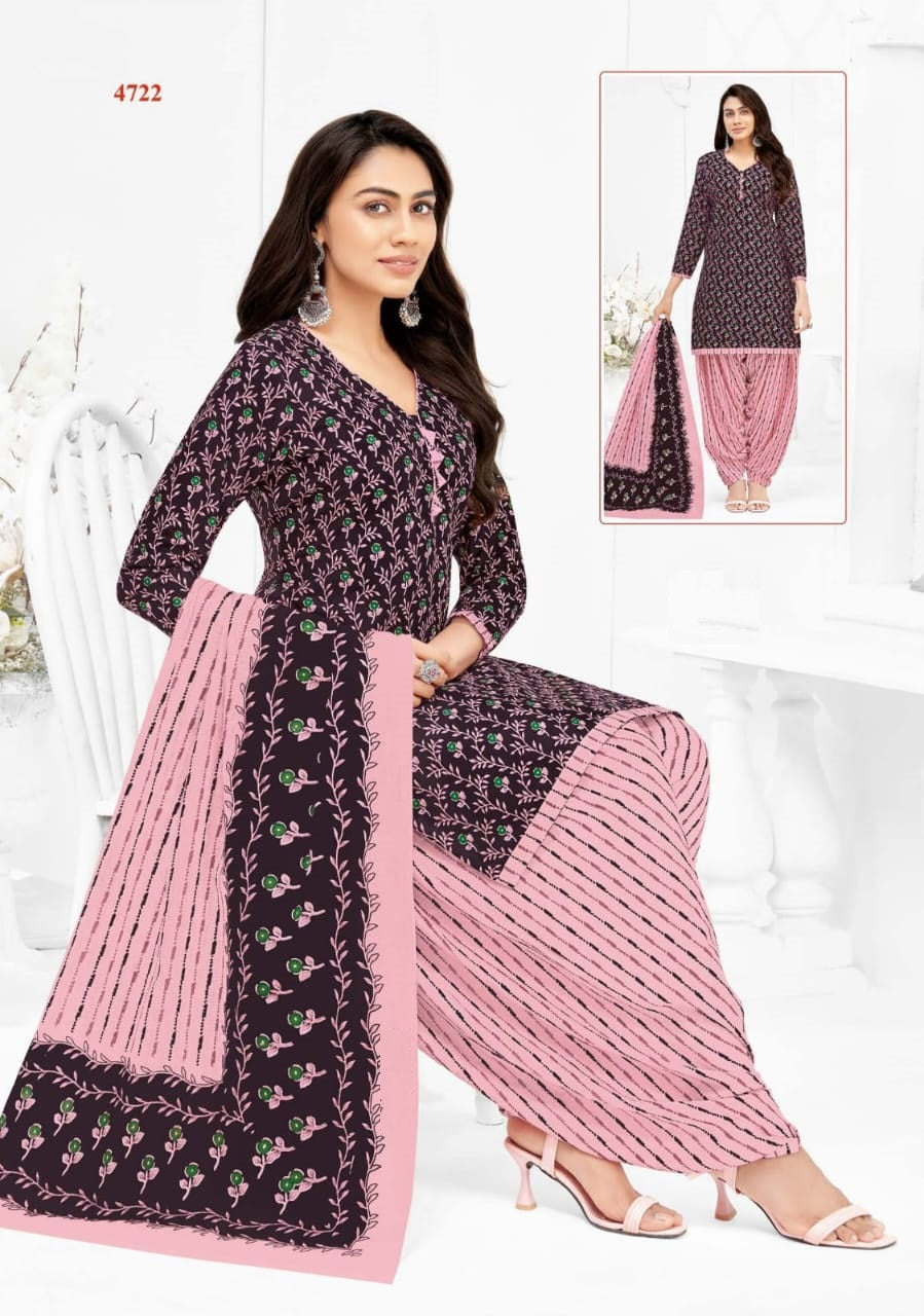 Woman wearing a black and pink traditional outfit with matching dupatta on a white background.