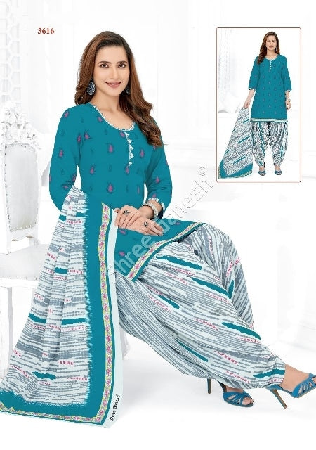 A woman wearing a sky blue cotton suit with floral print, consisting of a top and patiala bottom, by DeepTex suits.