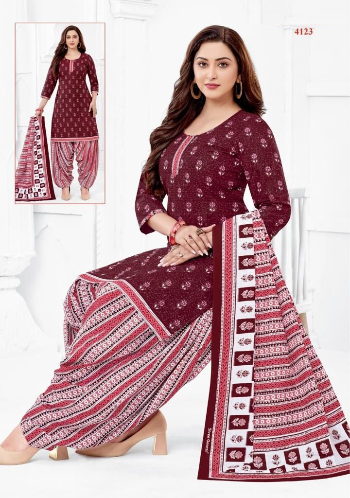 A ready-to-wear maroon and white printed cotton suit with a dupatta, consisting of a top and bottom, displayed on a model.