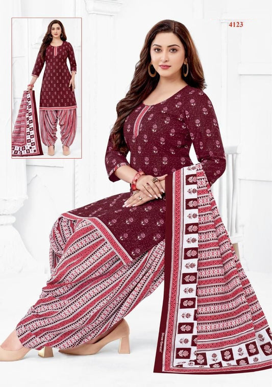 A ready-to-wear maroon and white printed cotton suit with a dupatta, consisting of a top and bottom, displayed on a model.